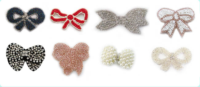 (8) Clear Bow Beads